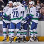Vancouver Canucks players celebrate after their second period goal against the Columbus Blue Jackets on March 12, 2013 at Nationwide Arena in Columbus, Ohio. (Photo by Jamie Sabau/NHLI via Getty Images)