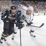 DALLAS, TX - MARCH 31: Alec Martinez #27 of the Los Angeles Kings battles for possession along the boards against Derek Roy #11 of the Dallas Stars at the American Airlines Center on March 31, 2013 in Dallas, Texas. (Photo by Glenn James/NHLI via Getty Images)