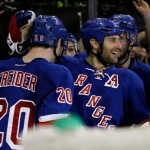 Chris Kreider #20 and Ryan Callahan #24 of the New York Rangers celebrate after Kreider scored the game-winning goal in overtime to give the Rangers a 4-3 win against the Boston Bruins in Game Four of the Eastern Conference Semifinals during the 2013 NHL Stanley Cup Playoffs at Madison Square Garden on May 23, 2013 in New York City.  (Photo by Bruce Bennett/Getty Images)